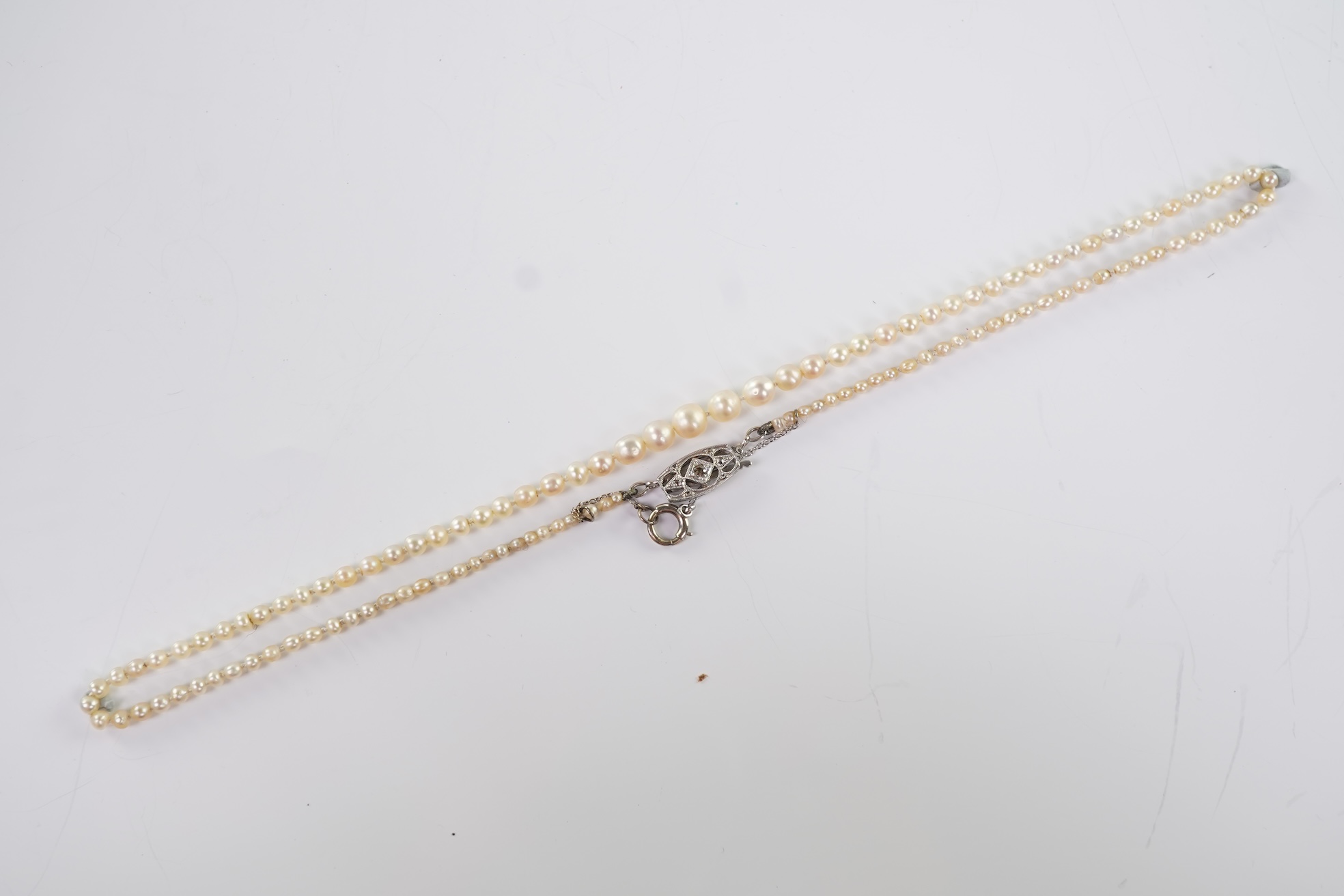 A cultured pearl and diamond necklace, early 20th century
